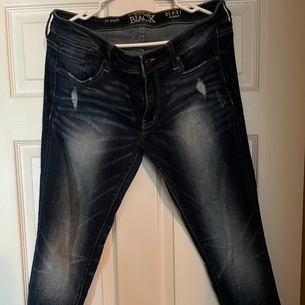 buckle black skinny jeans